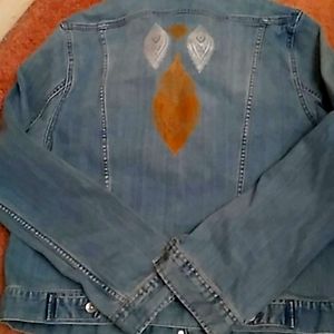 Denim jacket with henna design on back